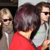 Emma Stone et Andrew Garfield à l'aéroport de Los Angeles, le 6 juin 2012.