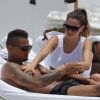 Kevin-Prince Boateng bichonné par sa sublime chérie Melissa Satta, à la plage à Miami le 7 juin 2012
