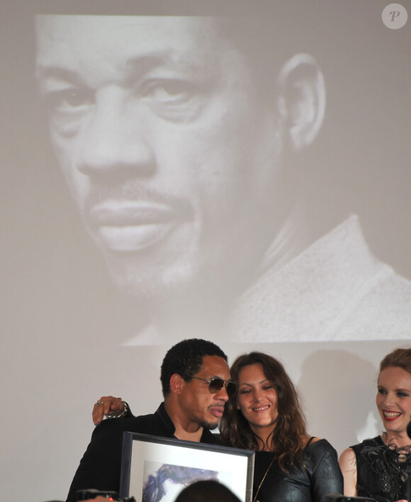 JoeyStarr en companie de Karole Rocher lors de la cérémonie de remise des Prix Romy-Schneider & Patrick-Dewaere, à Paris, le 11 juin 2012