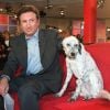 Michel Drucker et sa chienne Olga en mars 2000
