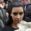 Kim Kardashian et Kanye West quittent le défilé haute couture du créateur Stéphane Rolland à la Cité de l'Architecture et du Patrimoine. Paris, le 3 juillet 2012.
