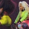 Nicki Minaj et sa danseuse se déhanchent sur la scène du Zénith de Paris. Le 6 juillet 2012.