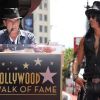 Slash honoré devant son ami Charlie Sheen, d'une étoile sur le Hollywood Walk of Fame, à Los Angeles le 10 juillet 2012