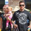 Pink, Carey Hart et leur fille Willow à New York, le 11 juillet 2012.