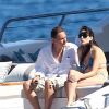 Eric Besson et son épouse Yasmine à bord d'un yacht au large de Saint-Tropez, le 12 juillet 2012.