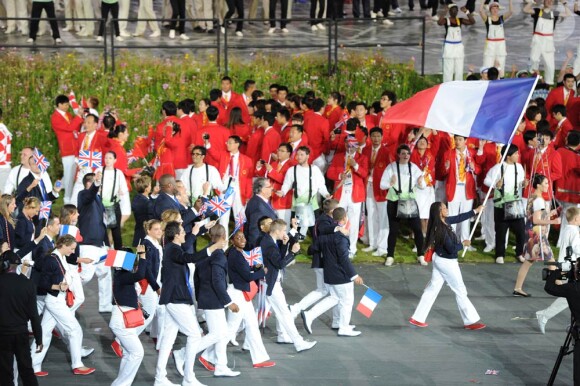 Laura Flessel, fière porte-drapeau de la délégation française lors de la cérémonie d'ouverture des Jeux olympiques de Londres 2012. 27 juillet