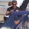 Sylvester Stallone quitte un yacht pour se rendre à l'aéroport de Nice et rejoindre Paris, le mercredi 8 août 2012.