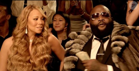 Mariah Carey et Rick Ross en spectateurs d'un combat de boxe dans le clip de Triumphant (Get 'Em).