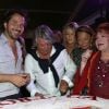 Edouard Baer et Régine à l'occasion d'une soirée caritative pour l'association Les Puits du Désert, au domaine de Bertaud-Belieu, au coeur de presqu'île de Saint-Tropez, le 30 août 2012.