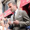David Beckham quitte le restaurant Balthazar dans le quartier de SoHo, après y avoir déjeuné avec sa femme Victoria Beckham et leur fille Harper. New York, le 9 septembre 2012.