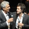 Enrico Macias, rejoint par Mickael Miro, fête 50 ans de carrière sur la scène de l'Olympia à Paris, le 8 septembre 2012.