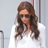 Victoria Beckham, entièrement habillée des vêtements de sa dernière collection et chaussée d'escarpins Manolo Blahnik, quitte la boutique Balenciaga située sur 22nd Street. New York, le 11 septembre 2012.