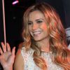 Clara Morgane, séduisante lors de la présentation de son nouveau calendrier Clara Morgane 2013 dans les Salons du Louvre de Paris le 20 septembre 2012