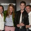 Michael Bublé entouré des jumeaux Dean et Dan Caten, créateurs de la marque DSquared2, à leur défilé à Milan, le 24 septembre 2012.