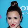 Demi Lovato, souriante à la soirée des finalistes de X Factor à Los Angeles le 5 novembre 2012.