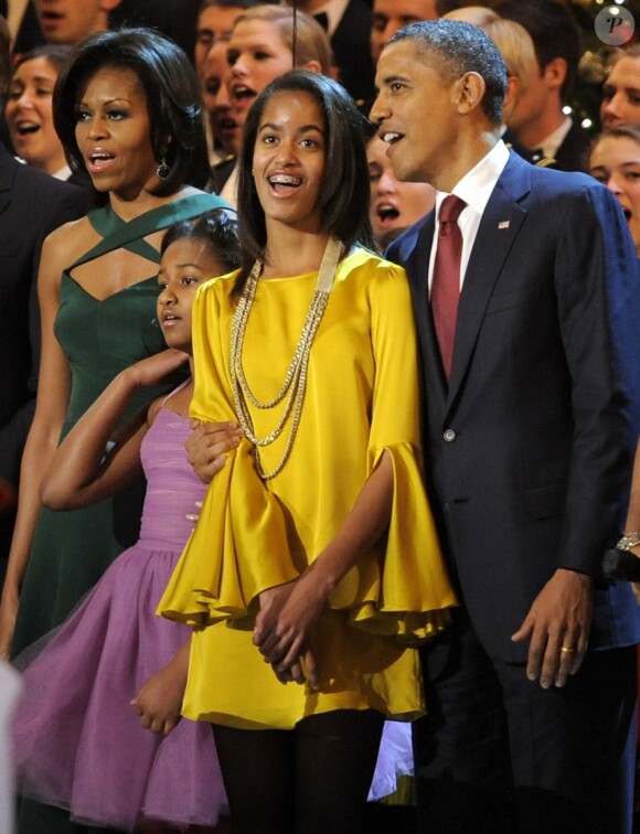 Sasha et Malia Obama, lookées pour soutenir leur papa en décembre 2011