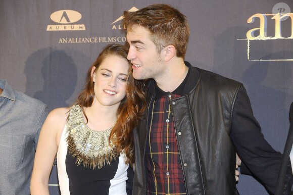 Kristen Stewart et Robert Pattinson lors du photocall du film Twilight - chapitre 5 : Révélation (2e partie) à Madrid le 15 novembre 2012
