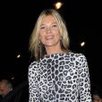 Kate Moss, habillée d'une robe Marc Jacobs et d'escarpins noirs Christian Louboutin arrive à la boutique Bookmarc dans le quartier de Mayfair pour signer des exemplaires de son livre The Kate Moss Book. Londres, le 15 novembre 2012.