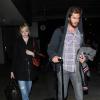 Emma Stone et Andrew Garfield arrivent à l'aéroport de Los Angeles, le 16 novembre 2012.