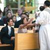 Marc Anthony et son ex-épouse Dayanara Torres lors du baptême de leur second fils Ryan en août 2004.