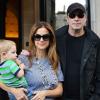 John Travolta et sa femme Kelly Preston, avec leur fils Benjamin, à Paris le 12 septembre 2012