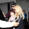 Jessica Simpson et son fiancé Eric Johnson arrivent à l'aéroport de Los Angeles avec leur fille Maxwell le 29 novembre 2012.
