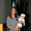 La famille Kardashian fête l'anniversaire de Mason Disick à Miami, le 14 décembre 2012. Ici on peut voir Kourtney et la petite dernière de la famille.