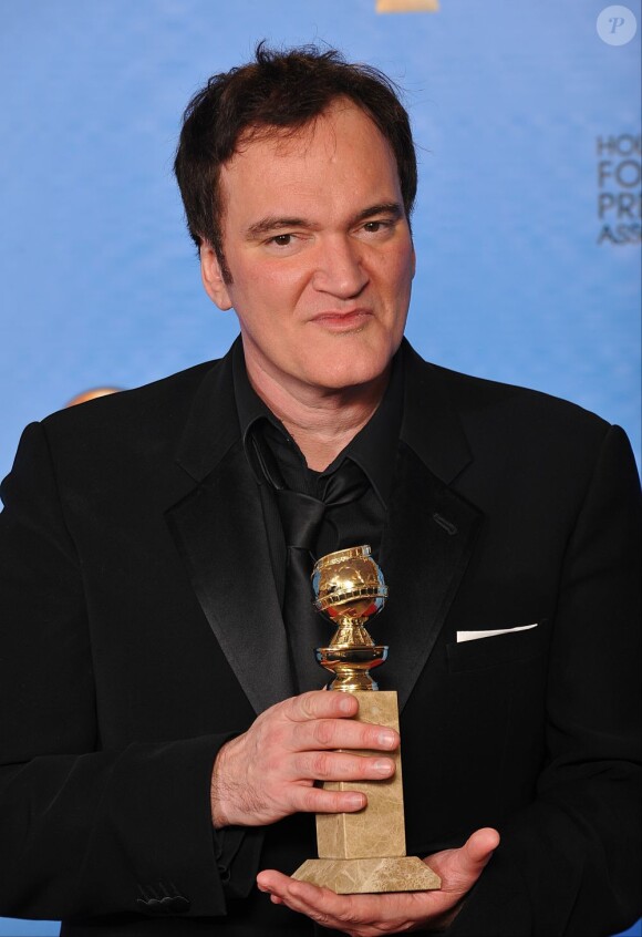 Quentin Tarantino remporte le prix du meilleur scénario original aux Golden Globes Awards 2013 à Los Angeles, le 13 janvier 2013.