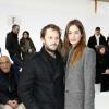 Nicolas Duvauchelle et sa compagne Laura Isaaz lors du défilé Dior le 19 janvier 2013.