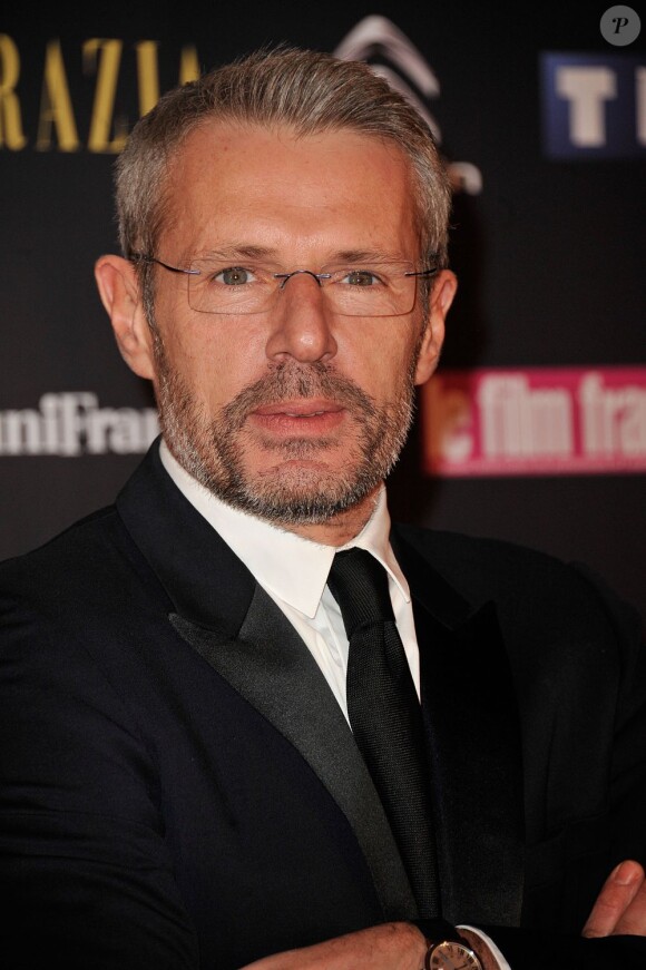 Lambert Wilson pose à la 20e cérémonie des Trophées du Film Français au Palais Brogniart à Paris, le 5 fevrier 2013.