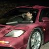 Rowan Atkinson au volant de son bolide McLaren, sort de chez chez le prince Charles, à Londres, le 15 novembre 1998.