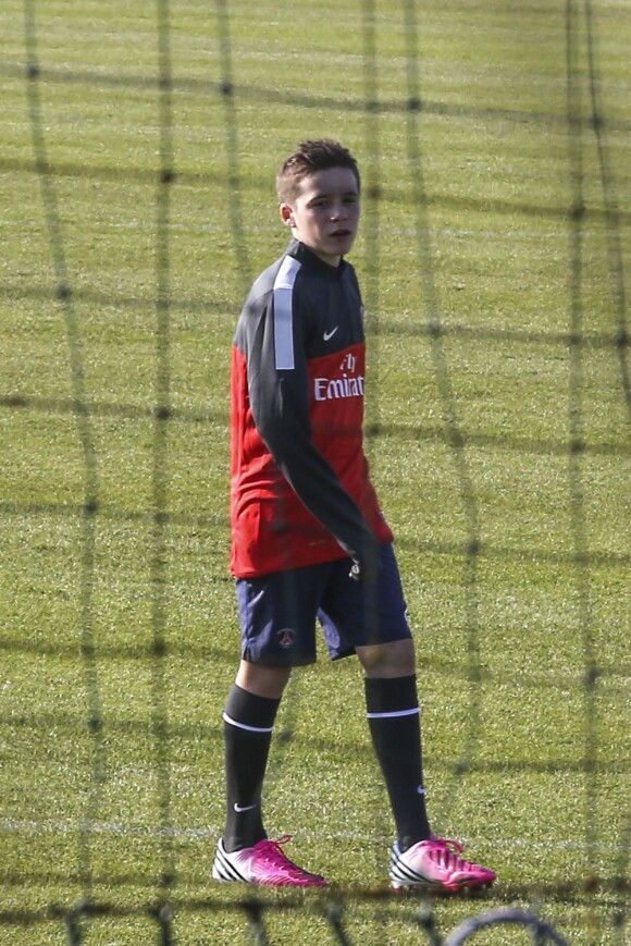 Brooklyn Beckham s'entraîne au Camp des Loges, le 19 février 2013.