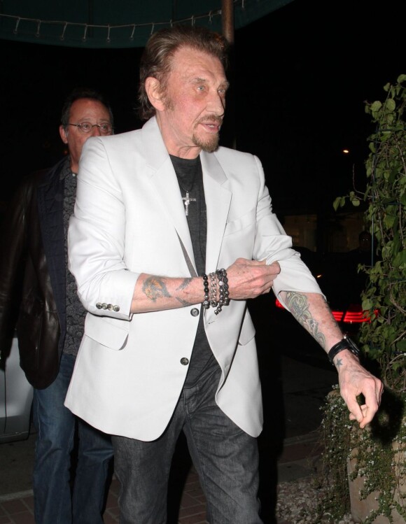 Johnny Hallyday et Jean Reno ont dîné chez Madeo à West Hollywood, le 18 février 2013.