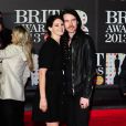 Lana Del Rey et son compagnon Barry James O'Neil aux Brit Awards 2013, le 20 février, à Londres.