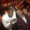 Kim Kardashian à une soirée avec son compagnon Kanye West et Riccardo Tisci, directeur de la création chez Givenchy.