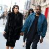Kim Kardashian et Kanye West en mars 2013 durant la Fashion Week à Paris