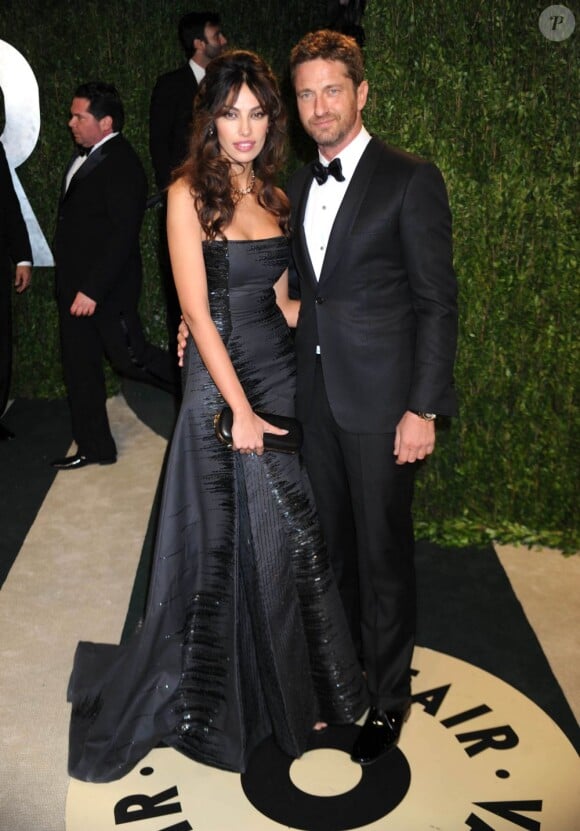 Madalina Ghenea et Gerard Butler lors de la soirée Vanity Fair post-Oscars le 24 février 2013