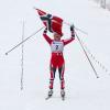 Le roi Harald V de Norvège et la reine Sonja ont fait un triomphe à la Norvégienne Therese Johaug, victorieuse du 30 km libre à Holmenkollen (Oslo) le 17 mars 2012.