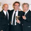 Patrick Stewart et Ian McKellen entour le réalisateur Danny Boyle lors des BAFTA 2009, à Londres.