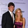 Eli Manning, quarterback des New York Giants, et sa femme Abby en juin 2008. En mars 2013, le couple annonce qu'il attend son deuxième enfant.