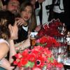Charlotte Casiraghi et Gad Elmaleh, complices même à table, ont rendu publique leur histoire d'amour en prenant part en couple au Bal de la Rose 2013, le 23 mars 2012 au Sporting de Monte-Carlo.