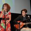 Clémentine Célarié chante avec ses fils Abraham et Balthazar lors de la cérémonie d'ouverture du Festival Atmosphères dont elle est marraine à Courbevoie le 2 Avril 2013.