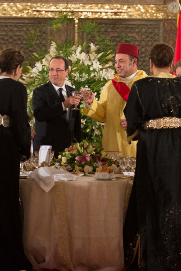 François Hollande et le roi Mohammed VI lors d'un dîner d'Etat au Palais Royal de Casablanca le 3 avril 2013.