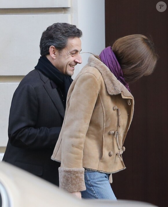 Nicolas Sarkozy et Carla Bruni-Sarkozy à la sortie du Royal Monceau samedi 9 février 2013.