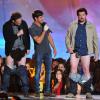 Seth Rogen, Zac Efron et Danny McBride sur la scène des MTV Movie Awards, à Los Angeles, le 14 avril 2013.