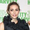 Elizabeth Olsen à la 19e soirée annuelle de charité City Harvest qui oeuvre afin d'offrir de la nourriture aux New-Yorkais dans le besoin. A New York, le 16 avril 2013.