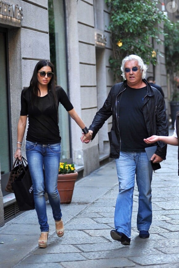 Flavio Briatore et sa femme Elisabetta Gregoraci, couple complice à Milan le 18 avril 2013