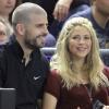 Shakira et Gerard Piqué, heureux lors du match de quart de finale de l'Europaligue entre Barcelone et le Panathinaïkos à Barcelone le 25 avril 2013
