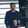 David Beckham avec ses fils Cruz, Romeo et Brooklyn lors de la 35e journée du championnat de France de football, au Parc des Princes, entre le PSG et Valenciennes (1-1) à Paris le 5 mai 2013.