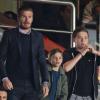 Moment privilégié entre hommes. David Beckham avec ses fils Cruz, Romeo et Brooklyn lors de la 35e journée du championnat de France de football, au Parc des Princes, entre le PSG et Valenciennes (1-1) à Paris le 5 mai 2013.